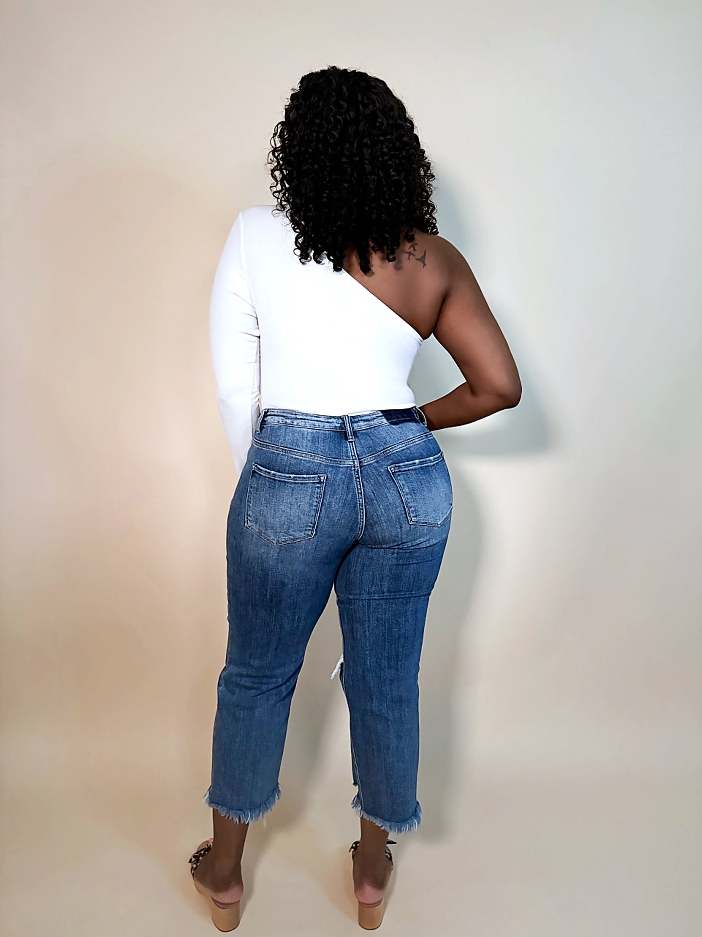 High Rise Dad Jeans denim Back View Cropped light blue High-waisted women’s jeans front slit Women’s ripped jeans